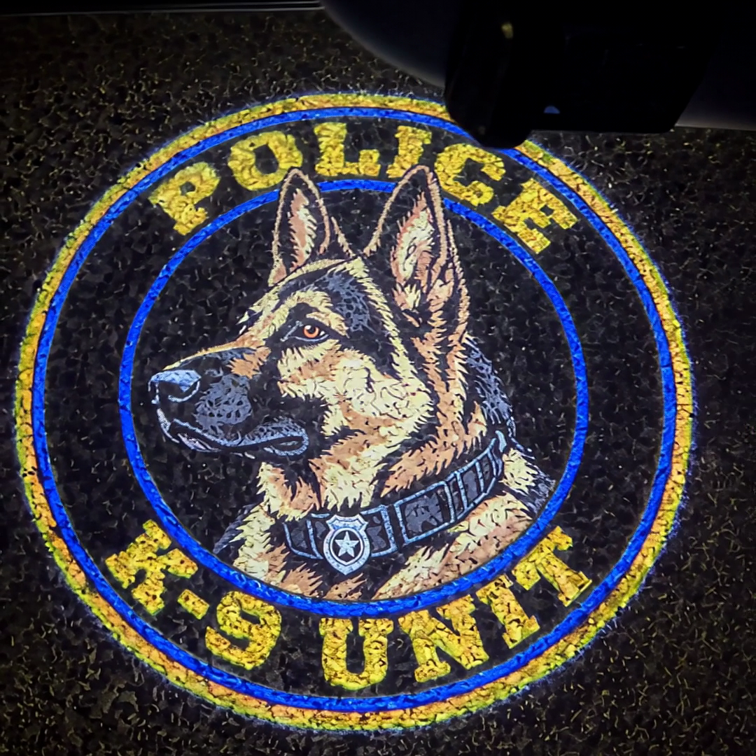 The K-9 unit badge projected on the pavement